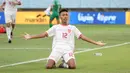 <p>Pemain Timnas Indonesia U-16, Daniel Alfrido, melakukan selebrasi setelah mencetak gol ke gawang Vietnam pada laga perebutan tempat ketiga Piala AFF U-16 2024 di Stadion Manahan, Solo, Jawa Tengah, Rabu (7/3/2024). (Bola.com/Abdul Aziz)</p>