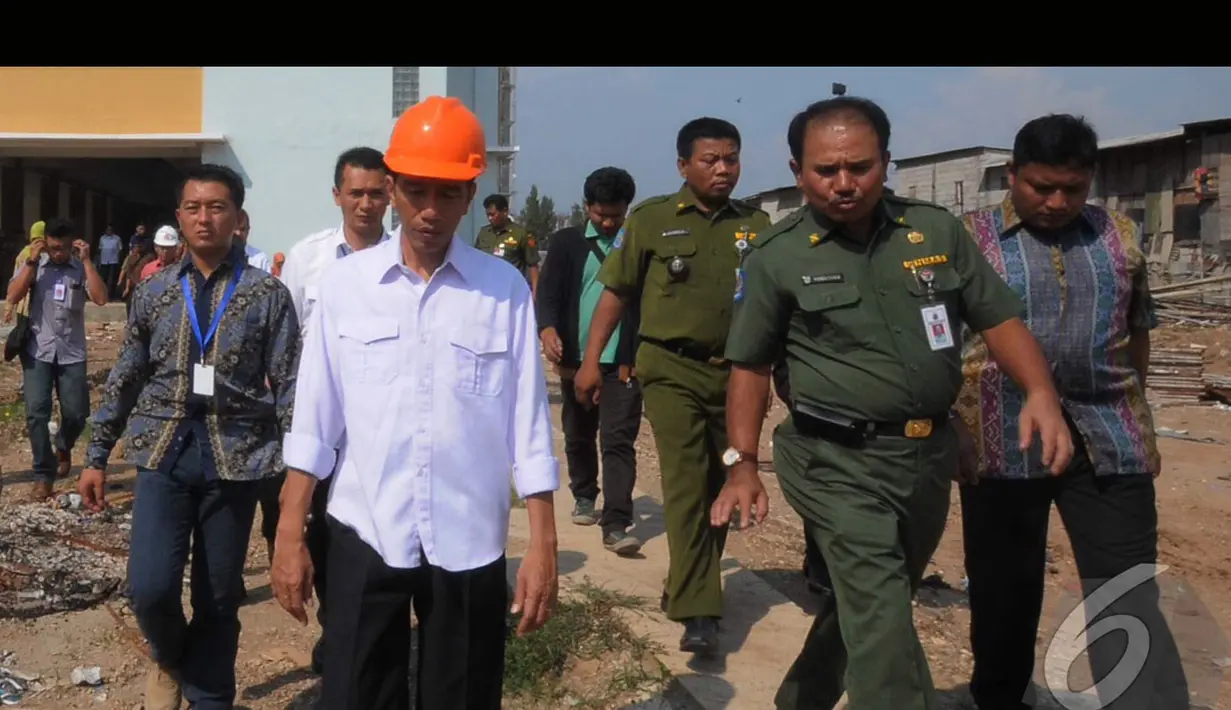 Gubernur DKI Jakarta Joko Widodo (Jokowi) blusukan ke Rusun di Kawasan Muara Baru, Jakarta Utara, Senin (4/8/2014) (Liputan6.com/Herman Zakharia)
