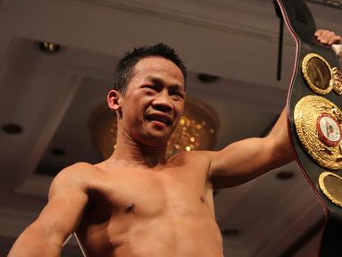 Petinju Indonesia, Daud Yordan, merebut gelar interim WBA International kelas ringan setelah menang angka mutlak atas petinju Argentina, Cristian Rafael Coria, di Radisson Victoria Plaza, Monteviedo, Uruguay, Sabtu (4/6/2016). (Daud Yordan Media)