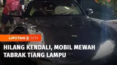 Satu sedan mewah ringsek usai menabrak tiang lampu jalan dan pot besar di pinggir Jalan MH Thamrin, Menteng, Jakarta Pusat.