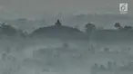 Pemandangan Candi Borobudur saat pagi hari dari Punthuk Setumbu, Magelang, Jawa Tengah, Jumat (19/10). Dari Punthuk Setumbu tempat ini wisatawan bisa melihat kemegahan Candi Borobudur. (Liputan6.com/Herman Zakharia)