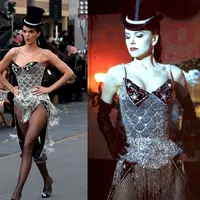 Gerak langkahnya di atas runway menjadi simbol penghormatan terhadap era keemasan Hollywood, sekaligus menegaskan posisi Vogue World sebagai panggung yang memadukan nostalgia dan inovasi mode. [X/@thebravobabe_].