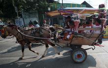 FOTO: Meriahnya Arak-arakan Puluhan Penganten Sunat Sambut HUT ke-497 DKI Jakarta