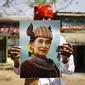 Seorang pendukung Suu Kyi. (Reuters)