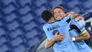 Penyerang Lazio, Ciro Immobile, merayakan gol saat menghadapi Borussia Dortmund pada laga Grup F Liga Champions 2020/2021 di Stadion Olimpico, Rabu (21/10/2020) dini hari WIB. Lazio menang 3-1 atas Borussia Dortmund. (AFP/Alberto Pizzoli)