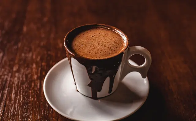 Ilustrasi minuman cokelat panas. (Photo by Giancarlo Duarte on Unsplash)