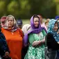 Para perempuan di Selandia Baru mengenakan kerudung sebagai bentuk solidaritas terhadap korban penembakan Christchurch (AFP)