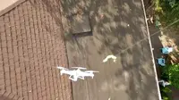 Misi Penyelamatan Drone yang Tersangkut di Atap Rumah