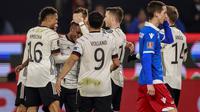 Timnas Jerman menang 9-0 atas Liechtenstein pada laga kesembilan Grup J kualifikasi Piala Dunia 2022 di Volkswagen Arena, Jumat (12/11/2021) dini hari WIB. (AFP/Odd Andersen)
