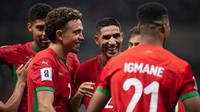 Para pemain Maroko merayakan gol mereka ke gawang Niger dalam pertandingan kualifikasi Grup E Piala Dunia di Stade Prince Moulay Abdallah, Rabat, Maroko, Sabtu (6-9-2025) dini hari WIB. (Foto AP)