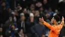 Pada masa tambahan waktu (90+2), Jude Bellingham mencetak gol kemenangan Real Madrid atas Manchester City. Skor 3-2 tidak berubah hingga peluit akhir pertandingan dibunyikan. (Oli SCARFF/AFP)
