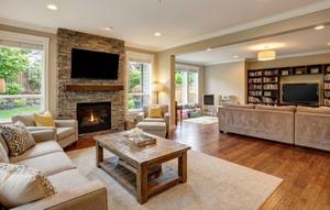 Desain Ruang Tamu dan Ruang Keluarga Menyatu Tanpa Dinding Pembatas/Gemini AI