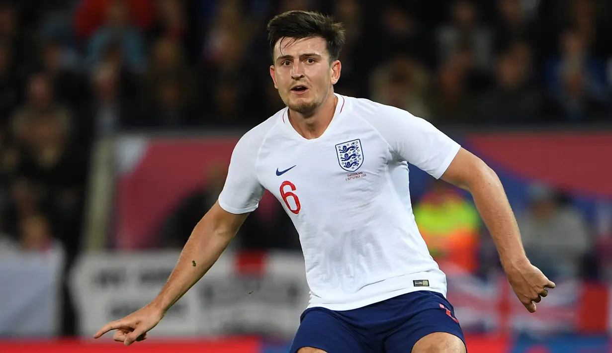 3. Harry Maguire (Leicester) - Ketertarikan Manchester United tidak membuat Leicester City melepas begitu saja Maguire. Kabarnya Leicester mematok harga 80 juta pound untuk Maguire. (Photo by Paul Ellis / AFP)