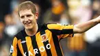 Selebrasi bek Hull City, Michael Turner seusai menjebol gawang Millwal di ajang FA Cup yang berlangsung di KC Stadium, Hull, 24 Januari 2009. AFP PHOTO/PAUL ELLIS