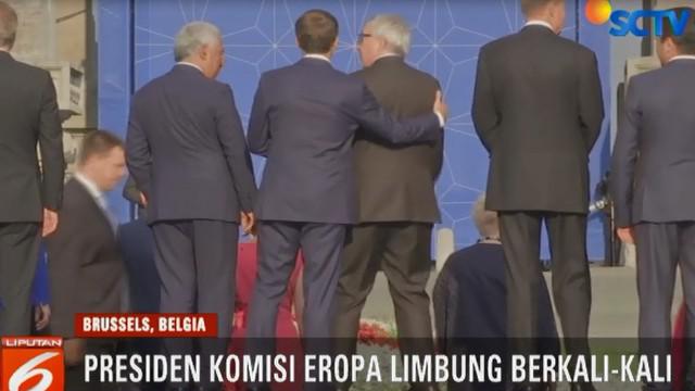 Juncker terhuyung-huyung hingga Presiden Finlandia dan Ukraina memeganginya terus.