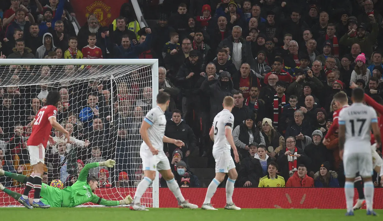 Manchester United berhasil unggul lebih dulu ketika pertandingan baru berjalan delapan menit berkat gol Scott McTominay. (AFP/Oli Scarff)