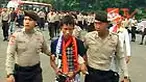 Polisi merazia barang bawaan Jakmania yang hendak berangkat ke Stadion Gelora Bung Karno, Senayan. Sore ini Persija bertanding melawan Persema.