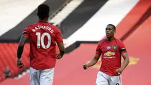 Anthony Martial merayakan golnya saat MU melawan Sheffield United di Liga Inggris (AP)