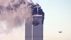 File foto pesawat komersial United Airlines penerbangan 175 mendekati menara selatan World Trade Center saat asap mengepul dari menara utara di Manhattan, New York pada 11 September 2001. (AFP/Seth Mcallister)