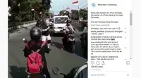 Seorang bule mengatur lalu lintas (@faktindo/Instagram)