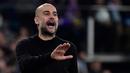 Pep Guardiola (27 juta euro) - Guardiola sukses membawa Man City merengkuh tujuh titel juara dalam tiga musim terakhir. Pelatih terbaik di dunia ini mendapatkan bayaran 27 juta euro oleh Manchester City. (AFP/Javier Soriano)