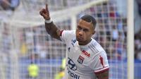 4. Memphis Depay - Pemain berusia 26 tahun ini dikenal sebagai striker yang cerdik dan pandai memecah konsentrasi pertahanan lawan. Depay sendiri telah menyumbangkan enam gol untuk Lyon di Liga Champions. (AFP/Romain Lafabregue)