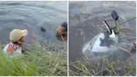 Kail pancingnya nyangkut di motor yang berada di dalam sungai. (sumber: TikTok/zayen77)