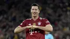 Penyerang Bayern Munchen, Robert Lewandowski berselebrasi setelah mencetak gol kelima untuk timnya ke gawang Benfica Lisbon pada pertandingan keempat Grup E yang dihelat di Allianz Arena, Rabu (3/11/2021) dini hari WIB. Munchen sukses menghajar Benfica dengan skor 5-2. (AP Photo/Matthias Schrader)