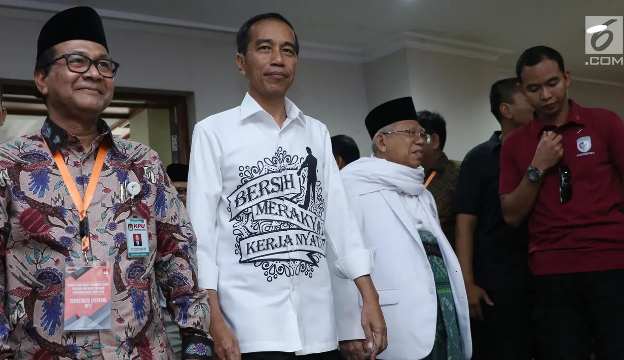 Pasangan Capres-cawapres, Joko Widodo dan Ma'ruf Amin tiba di gedung KPU untuk melakukan pendaftaran di Jakarta, Jumat (10/8). Pasangan Jokowi-Ma'ruf Amin mendaftarkan diri sebagai capres-cawapres di Pilpres 2019. (Liputan6.com/Helmi Fithriansyah)
