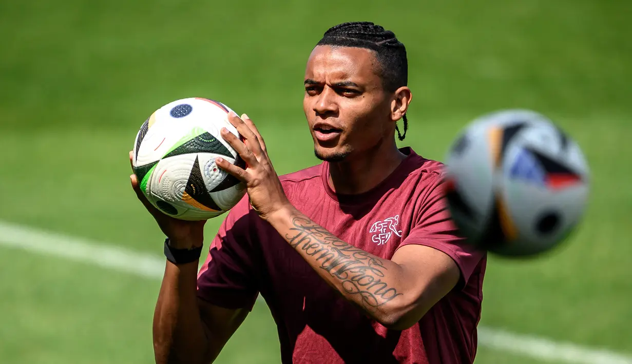 Swiss melaju ke babak 16 besar setelah finis sebagai runner-up Grup A Euro 2024, mengemas lima poin di bawah Jerman. (Fabrice COFFRINI / AFP)