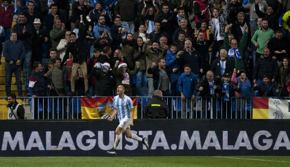 Pemain Malaga asal Brasil, Charles Dias de Oliveira mencetak satu gol untuk timnya saat melawan Getafe pada lanjutan La Liga Spanyol pekan ke-23. (AFP/Jorge Guerrero)