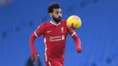 5. Mohamed Salah (23 gol) - Mohamed Salah tetap tampil konsisten dan tajam di sepanjang tahun 2020 ini. Pemain asal Mesir ini tercatat telah menyumbangkan 23 gol untuk Liverpool di semua kompetisi sepanjang tahun 2020. (AFP/Neil Hall/pool)