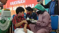 Badan Intelijen Negara Daerah (Binda) Provinsi Daerah Istimewa Yogyakarta menggelar vaksinasi anak usia 6-11 tahun di SD Tarakanita, Kecamatan Bumijo, Kabupaten Jetis. (Ist)