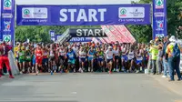 Ilustrasi lari maraton. (Photo by Steward Masweneng on Unsplash)