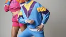 Bergaya 80's keduanya tampil nyentrik dengan track suit berwarna neon, lengkap dengan makeup dan gaya rambutnya. [Foto: Instagram/ DJ Winky]