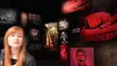 Karya seni berjudul 'Subaltern Portraits Gallery' buatan seniman Chile Voluspa Jarpa terlihat saat pratinjau pers menjelang pembukaan pameran International Venice Biennale di Venesia, Italia, Rabu (8/5/2019). (TIZIANA FABI/AFP)