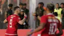 Striker Persija Jakarta, Marko Simic, melakukan selebrasi usai membobol gawang Kalteng Putra pada laga Liga 1 2019 di Stadion Madya, Jakarta, Selasa (20/8). Persija menang 3-0 atas Kalteng Putra. (Bola.com/M Iqbal Ichsan)