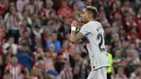 Raphinha menjadi pencetak gol kemenangan Barcelona atas Athletic Club pada laga pekan ke-25 Liga Spanyol 2022/2023 d San Mames, Senin (13/3/2023). (AP/Alvaro Barrientos)
