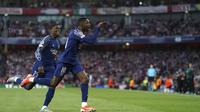 Pemain Paris Saint-Germain (PGS), Ousmane Dembele, mencetak gol penentu kemenangan timnya atas Arsenal dalam leg pertama semifinal Liga Champions di Emirates Stadium, Rabu (30/4/2025) dini hari WIB. PSG menang 1-0 di kandang Arsenal itu. (Adam Davy/PA via AP)