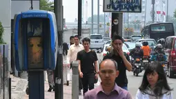 Kondisi telepon umum koin yang sudah tak aktif dan tak terawat, Jakarta, Senin (25/8/14). (Liputan6.com/Johan Tallo) 