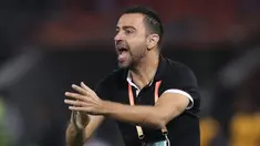 Mantan bintang Barcelona yang kini melatih klub Qatar Al Sadd diisukan akan menangani Barcelona musim depan menggantikan Ronald Koeman seiring habisnya kontrak di Al-Sadd pada 30 Juni ini. Sumber tepercaya menyebut, Xavi segera memperpanjang kontraknya hingga 2023. (AFP/Karim Jaafar)