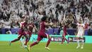 Pemain Qatar, Akram Afif, melakukan selebrasi setelah mencetak gol ke gawang Lebanon pada babak penyisihan Grup A Piala Asia 2023 di Stadion Lusail, Jumat (12/1/2024). Qatar menang tiga gol tanpa balas. (AP Photo/Thanassis Stavrakis)