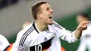 Germany's striker Lukas Podolski celebrates after scoring the 4-0 against Liechtenstein during their World Cup 2010 qualifying match on March 28, 2009 in Leipzig, eastern Germany. AFP PHOTO/OLIVER LANG