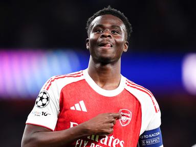 Pemain Arsenal, Bukayo Saka, melakukan selebrasi setelah mencetak gol ke gawang Atletico Madrid pada laga leg kedua semifinal Liga Champions di Stadion Emirates, Rabu (6/5/2026). (John Walton/PA via AP)