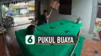 Objek buaya diganti oleh para pemuda yang berada di bawah karpet hijau.