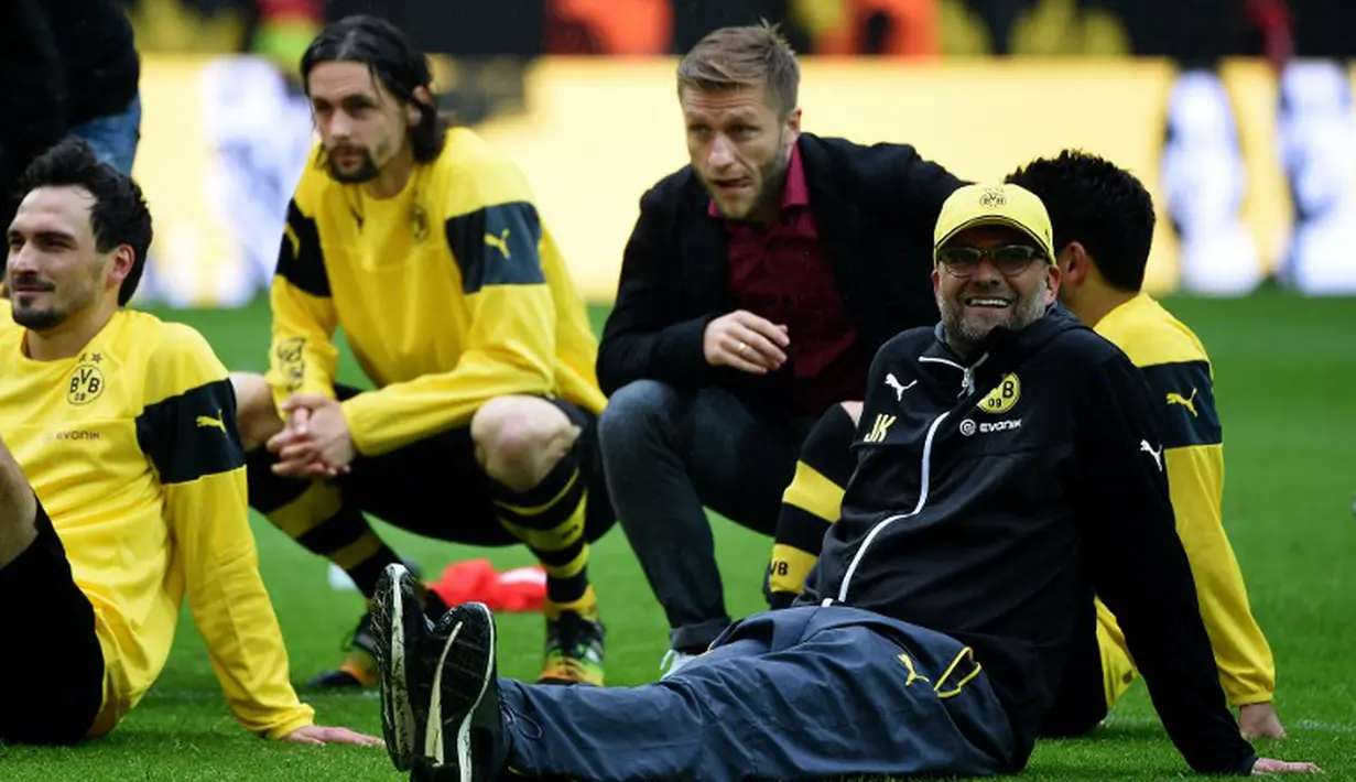 Selama tujuh musim membesut Dortmund, Juergen Klopp berhasil mempersembahkan lima gelar juara. (PATRIK STOLLARZ/AFP)