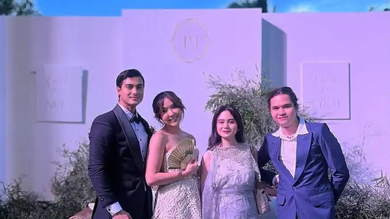 Detail Outfit Gisella Anastasia dan Cinta Brian saat Go Public di Kondangan Luna Maya & Maxime Bouttier