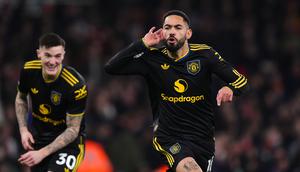 Pemain Manchester United (MU), Matheus Cunha, berlari merayakan gol yang dicetaknya ke gawang Arsenal pada lanjutan Liga Inggris 2025/2026 di Emirates Stadium, Minggu (26/1/2026) malam WIB. (Mike Egerton/PA via AP)