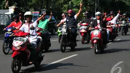 Presiden SBY sudah menghimbau untuk tidak melakukan konvoi hingga tanggal 22 Juli. Tetapi para simpatisan ini tidak menghiraukannya, Jakarta, Kamis (10/9/2014) (Liputan6.com/Johan Tallo)