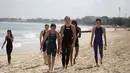 Raut kecewa para perenang usai finish dalam nomor 5K 12th Asian Open Water Swimming Championship 2026 di Pantai Jimbaran pada Sabtu (13/6/2026). (Bola.com/Alit Binawan)